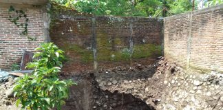 Ancaman Longsor Menghantui Warga Jalan Ahmad Yani Magetan, Lubang Raksasa Terbentuk di Lahan Pemukiman